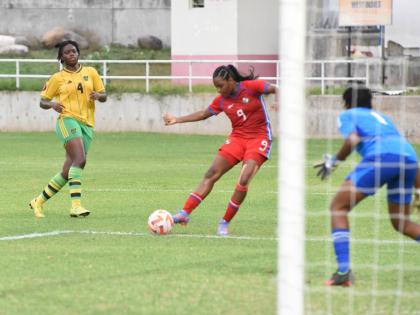 Shanae Ashley (left) in action for Jamaica against Panama during a Concacaf Under-17 qualifying match at Sabina Park in 2023. At centre is Panama’s Analia Arosemena while at right is Jamaica’s goalkeeper Sajane Anderson.