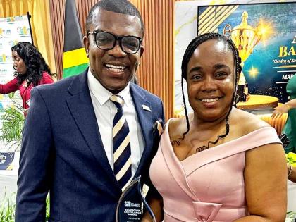 Anisa Wilson‑Smith, executive director of Life Skills Education Ltd and Excellence in Education awardee, with St Ann Chamber of Commerce president, Dr Ransford Davidson, at a recent award ceremony.