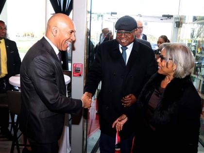 Tourism Minister Edmund Bartlett and his wife, Carmen, are greeted by Jamaica’s Ambassador to the United States, Major General (Ret’d) Antony Anderson (left), at Catherine’s Restaurant in Laurel, Maryland, ahead of the Jamaica Tourist Board Travel Ad
