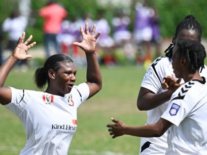 From left: Arnett Gardens’ Anna-Kay Richards celebrates with teammate and goalscorer Shikira Douglas, and Tasheka Reid (partially hidden) during a Jamaica Women’s Premier League encounter against Real Mona at the Alpha institute yesterday.