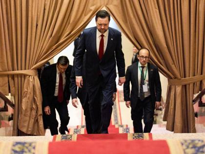 
United States Vice President J.D. Vance (centre) walks up a flight of stairs to meet with Pakistan’s Prime Minister Shehbaz Sharif for talks about Iran on Saturday in Islamabad.