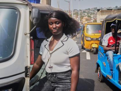 Halimatu Kamara, a rickshaw driver, poses for a portrait in Freetown, Sierra Leone.