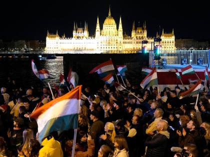 Supporters of Peter Magyar, the leader of the opposition Tisza party, celebrate after a parliamentary election in Budapest, Hungary, yesterday.