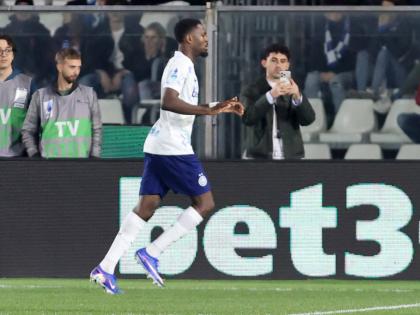 Inter Milan’s Marcus Thuram celebrates during the Serie A  match between Como and Inter, in Como, Italy, yesterday. Thuram scored a brace in Inter’s 4-3 win.