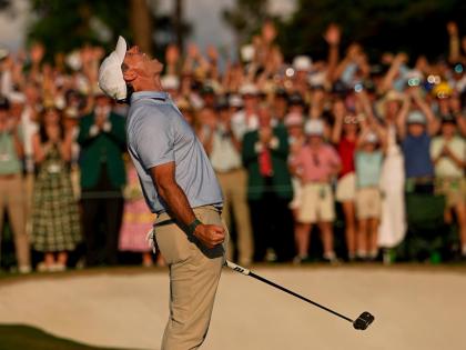 Rory McIlroy of Northern Ireland celebrates after winning the Masters golf tournament at the Augusta National Golf Club yesterday.