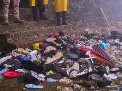 The shoes of victims of a deadly stampede sit by the main entrance of the Citadelle Laferriere in Milot, Haiti, Sunday, April 12, 2026. (AP Photo/Ketlain Difficile)