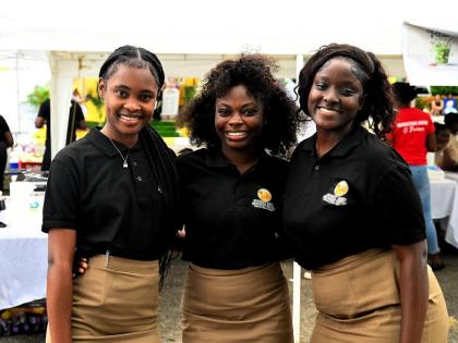 Students of the College of Agriculture, Science and Education in Portland (from left), Janane Terrelonge, Shanika Robinson, and Alicia Myers, who were members of the student-operated business, ‘Sweet & Savoury Bites’, whose booth was featured at the in