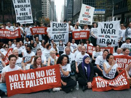 Chelsea Manning, bottom second left, and protesters with Jewish Voice for Peace block traffic during a demonstration outside the New York office of US Senator Chuck Schumer, calling for an end to the US-Israel war with Iran and opposing US weapons support,