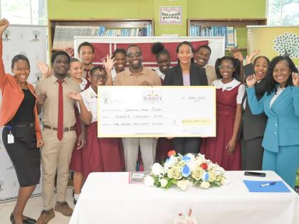 Minister of State in the Ministry of Education, Skills, Youth and Information, Rhoda Moy Crawford (front, fifth left); head of the Burnett Family Foundation, Dale Burnett (front, fourth left); director for donor and partnership management at the National E