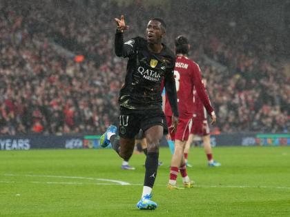 PSG’s Ousmane Dembele celebrates after scoring during the Champions League quarter-final second leg football match against Liverpool at Anfield in Liverpool, England, yesterday.