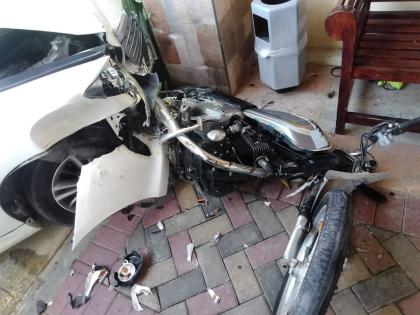 The mangled wreckage of a motorcycle that was rammed by a motorist who foiled a robbery attempt on Wednesday. Both attackers were captured.