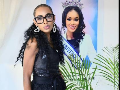 Hannah Sheree (left), pageant director, Miss Universe Jamaica Westmoreland, poses in front of a picture of reigning queen Miss Universe Jamaica West 2025 Samantha McFarlane.