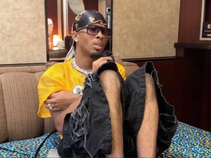 Singer-songwriter David Burke, aka D4vd, sits in the artiste space at the Coachella music festival on April 18, 2025 in Indio, California.