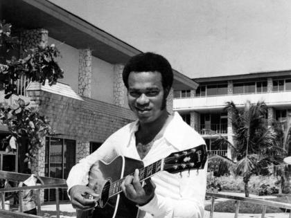 Ernie Smith is captured in a June 18, 1971, file photograph with his guitar in hand.
