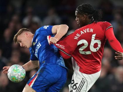 
Chelsea’s Liam Delap (left) and Manchester United’s Ayden Heaven challenge for the ball during their English Premier League football match at Stamford Bridge in London yesterday.