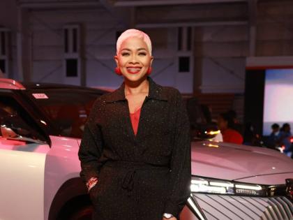 Ever on brand, media personality and the event’s host, Deborah ‘Debbie’ Bissoon, is sleek in a stylish black one-piece with a hint of Fidelity Motors red at the official launch event for the GAC brand held at the National Indoor Sports Centre on Wedn