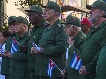 Cuban President Miguel Diaz-Canel, centre, attends a celebration marking the 65th anniversary of the proclamation declaring the Cuban Revolution socialist, in Havana, Cuba, Thursday, April 16, 2026. (AP Photo/Ramon Espinosa)