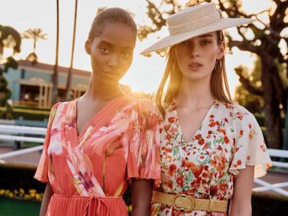 Tami Williams (left) sports the pleated Abigail maxi dress, which features a v-neckline and a faux-wrap bodice, while Dutch model Julia Bergshoeff wears the Lovette cream floral midi dress with fluted sleeve and a modern rattan belt. 