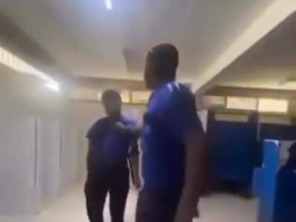 A screenshot from a video showing a Jamaica College student being assaulted by a schoolmate. 
