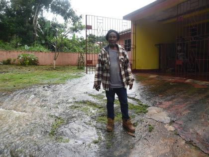 Leebert Campbell says after Hurricane Melissa left his home submerged by floodwaters, he now lives in constant apprehension of heavy rainfall.