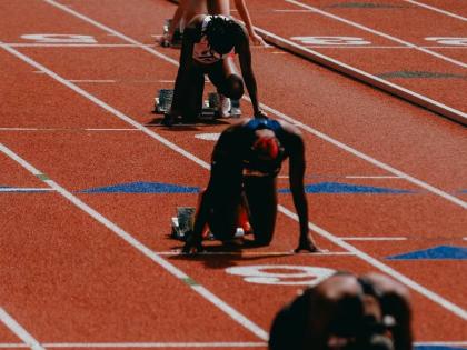 Penn Relays teams await the gun in the girls’ 4x100m.