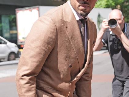 Chris Brown arrives at Southwark Crown Court, where he is charged over an alleged assault in a London nightclub, in London, Friday, July 24, 2026. (Stefan Rousseau/PA via AP)