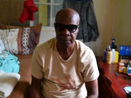 
Edgar Bruce sits in the small kitchen that he lives in at the Mt Matthews Church of the Nazarene in Logwood, Shrewsbury in Westmoreland