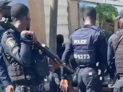 Cops at the scene of a fatal police shooting in West Kingston on July 26. 
