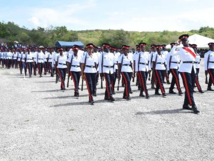 Former recruits marching in unison at a Jamaica Constabulary Force passing out parade and awards ceremony.