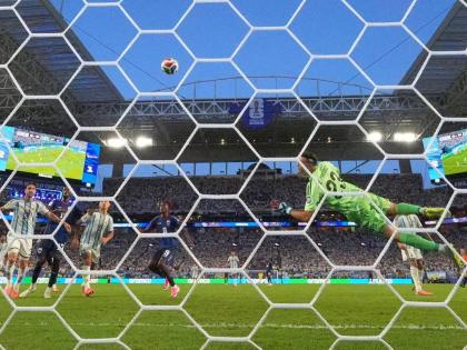 Argentina goalkeeper Emiliano Martinez (23) is beaten by a shot from Cape Verde’s Sidny Lopes Cabral (13) during the World Cup round-of-32 football match in Miami Gardens, Florida, Friday, July 3.