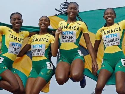 Jamaica’s 4x100-metre relay team celebrate winning the World U20 Championships title in Lima, Peru in 2022.