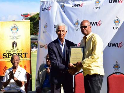In this February 17, 2019, photo, Sir Garfield Sobers (left) is honoured as a UWI Vice-Chancellor’s XI ‘Immortal’ by Vice-Chancellor Professor Sir Hilary Beckles. - UWI Photo Archives