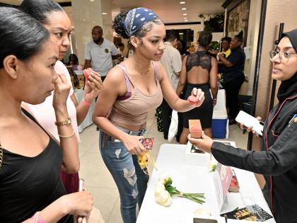These ladies partake of an offering at the 11th staging of the Ministry of Tourism/Tourism Enhancement Fund’s Christmas in July trade show at The Jamaica Pegasus hotel in New Kingston on Friday, July 10, 2026. 