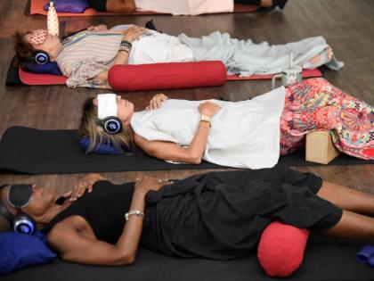 Participants are guided through a 9D Breathwork session at Yahsuh Fitbox in St Andrew on Saturday.