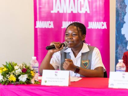 Montego Bay High School for Girls student Thaejadore Kerr makes a point during the finals of the Minister of Tourism Public Speaking Competition, where she emerged the winner.