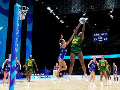 Azara Wilmot of Jamaica (centre right) and Cerys Finn of Scotland in action during the Netball preliminary round Pool B match at the Commonwealth Games in Glasgow, Scotland, yesterday.