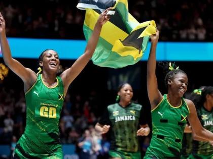 
Sunshine Girls Latanya Wilson (left) and Shanice Beckford celebrate victory over Australia in the semi-finals of the netball competition at the Commonwealth Games in Glasgow, Scotland, yesterday.  