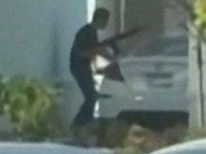 A screen shot from a video of the shooting incident at In-N-Out Burger.