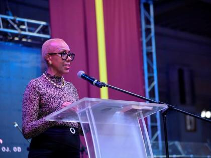Minister of Finance, Fayval Williams, delivering remarks on behalf of Prime Minister Dr Andrew Holness at the funeral of late track and field coach Stephen Francis at the National Indoors Sports Centre in St Andrew on August 15, 2026.