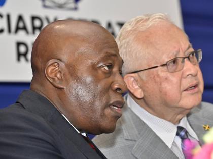 Delroy Chuck (right), minister of justice and constitutional affairs, and Chief Justice Bryan Sykes.