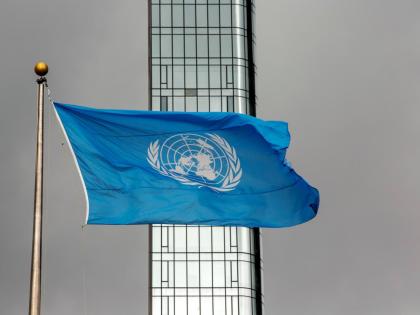 The UN flag flies on a stormy day at the United Nations during the United Nations General Assembly.