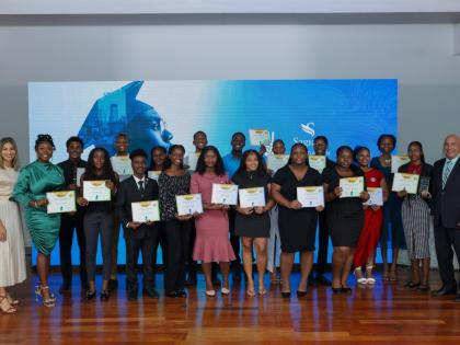 The 2026 cohort of Sagicor Foundation Jamaica’s Tertiary Scholarship Programme poses for a group photograph alongside Christopher Zacca (far right), president & CEO, Sagicor Group Jamaica and chairman of Sagicor Foundation Jamaica, and Nicole Campbell Ro