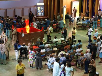 Guests gather at the life-size Tabernacle exhibition in the United States