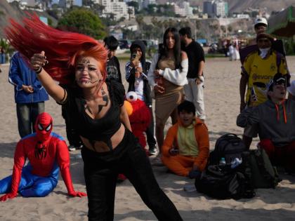 A participant who goes by ‘Ciclope’, or Cyclops, competes in an aura-farming battle at Las Sombrillas beach in Lima, Peru. 