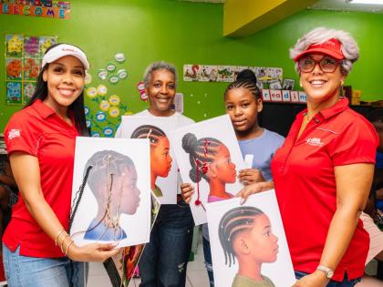 (From left) Ronique Satchell, administrative assistant of the JMMB Joan Duncan Foundation; Simone Fisher Sobers, founder of the Winsome Wishes For KIDS; one of the participating campers and Kim Mair, CEO of the JMMB Joan Duncan Foundation, pause for a phot