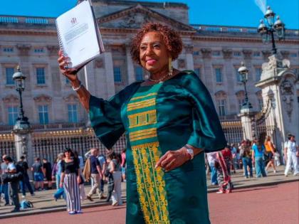 
Culture Minister Olivia Grange with Jamaica’s reparations petition to King Charles outside Buckingham Palace in the United Kingdom on September 7, 2026.
