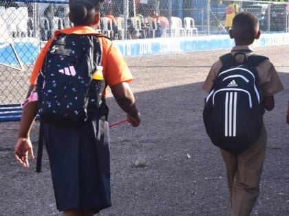 Students of Edward Seaga Primary School in Kingston arrive for classes on the first day of the 2026-27 academic year last Monday.