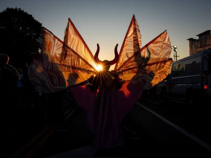 People participate in J'Ouvert festivities ahead of the West Indian American Day Parade at sunrise on Labor Day in the Crown Heights and Flatbush neighborhoods of Brooklyn, New York, on Monday. - AP Photo
