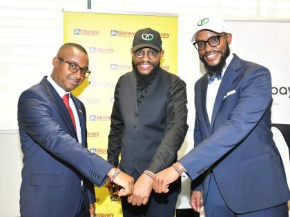 Horace Hines (left), general manager, JN Money Services, shares a moment with co-founders of WapiPay, Edward Ndichu (right) and Paul Ndichu following the signing of their partnership agreement with the Kenya-based company to support payments to Jamaica thr