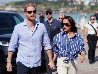  Prince Harry, and Meghan, the Duke and Duchess of Sussex, arrive for an event, during a visit to Bondi Beach, Australia, April 17.
